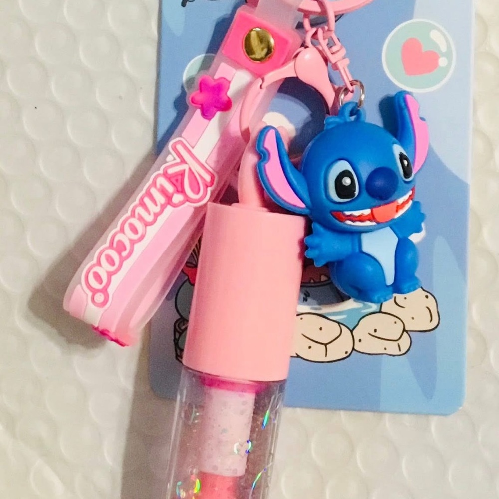 Lipgloss and stitch keychain in one